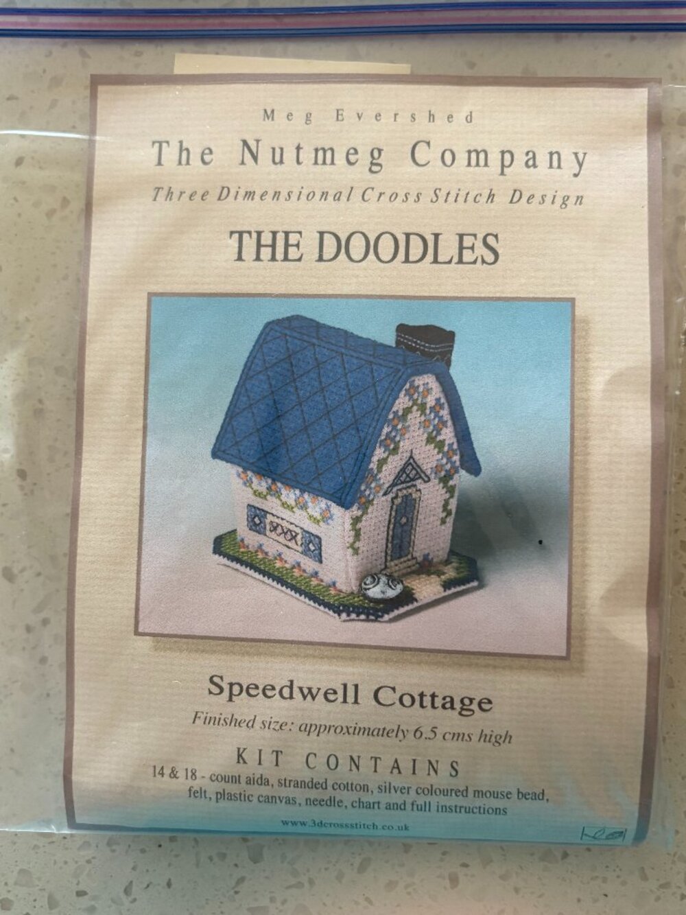 Cross stitch, three dimensional house